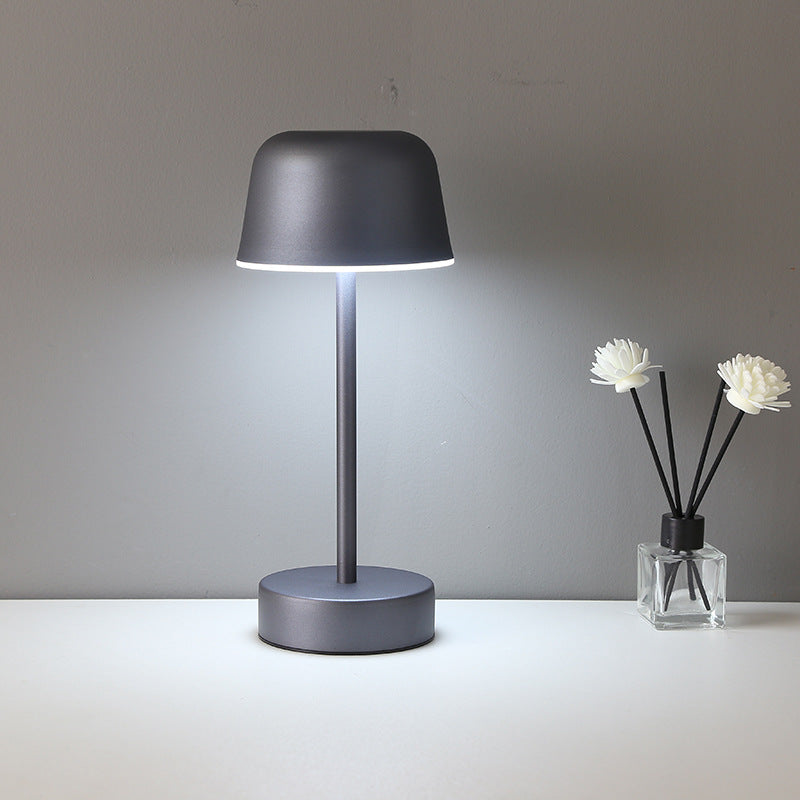 Red minimalist LED table lamp with touch control base, cordless design, and modern aesthetic — view 4