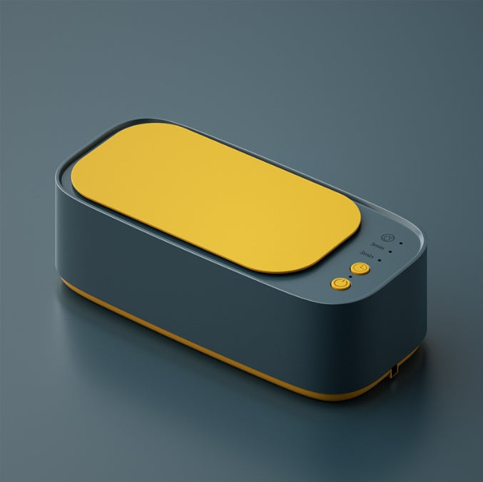 Green portable ultrasonic cleaner machine for jewellery and glasses crafted from durable ABS plastic.