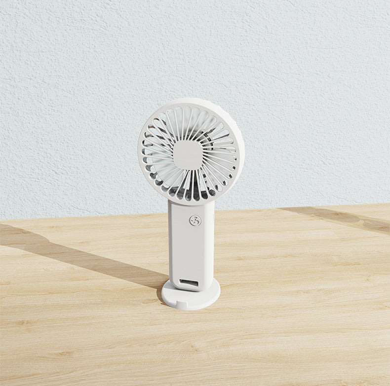 Two white portable mini handheld fans with desktop base and integrated phone stand
