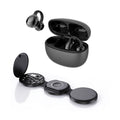 Black 5-in-1 folding wireless charging station next to compact true wireless earbuds with charging case