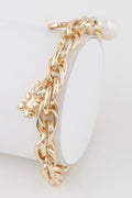 Structured polished metal chain bracelet featuring a charming teddy bear motif for women