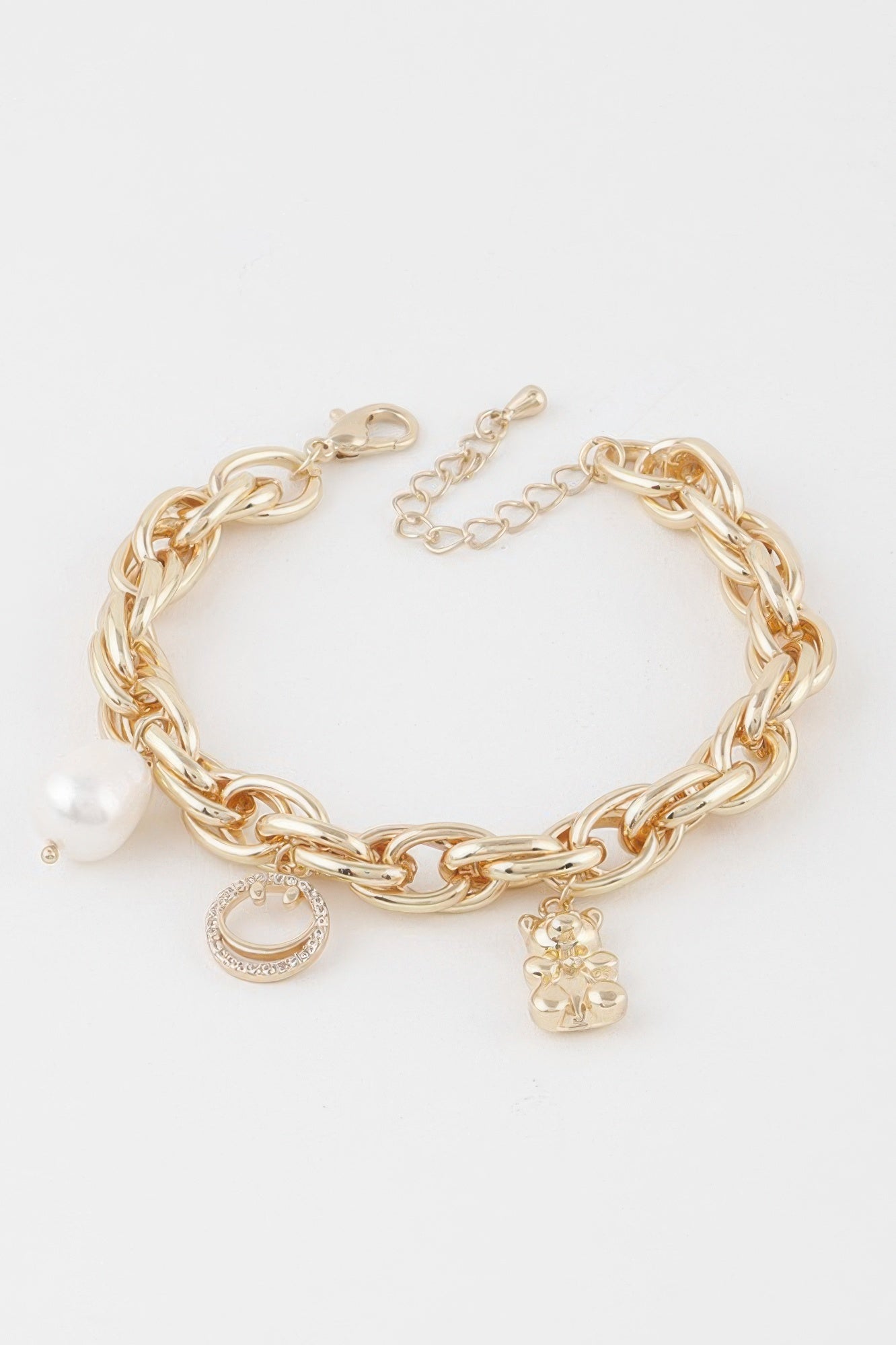 Structured polished metal chain bracelet featuring a charming teddy bear motif for women — view 2