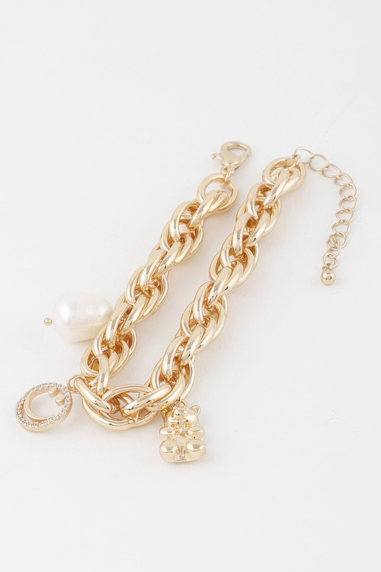 Structured polished metal chain bracelet featuring a charming teddy bear motif for women — view 3