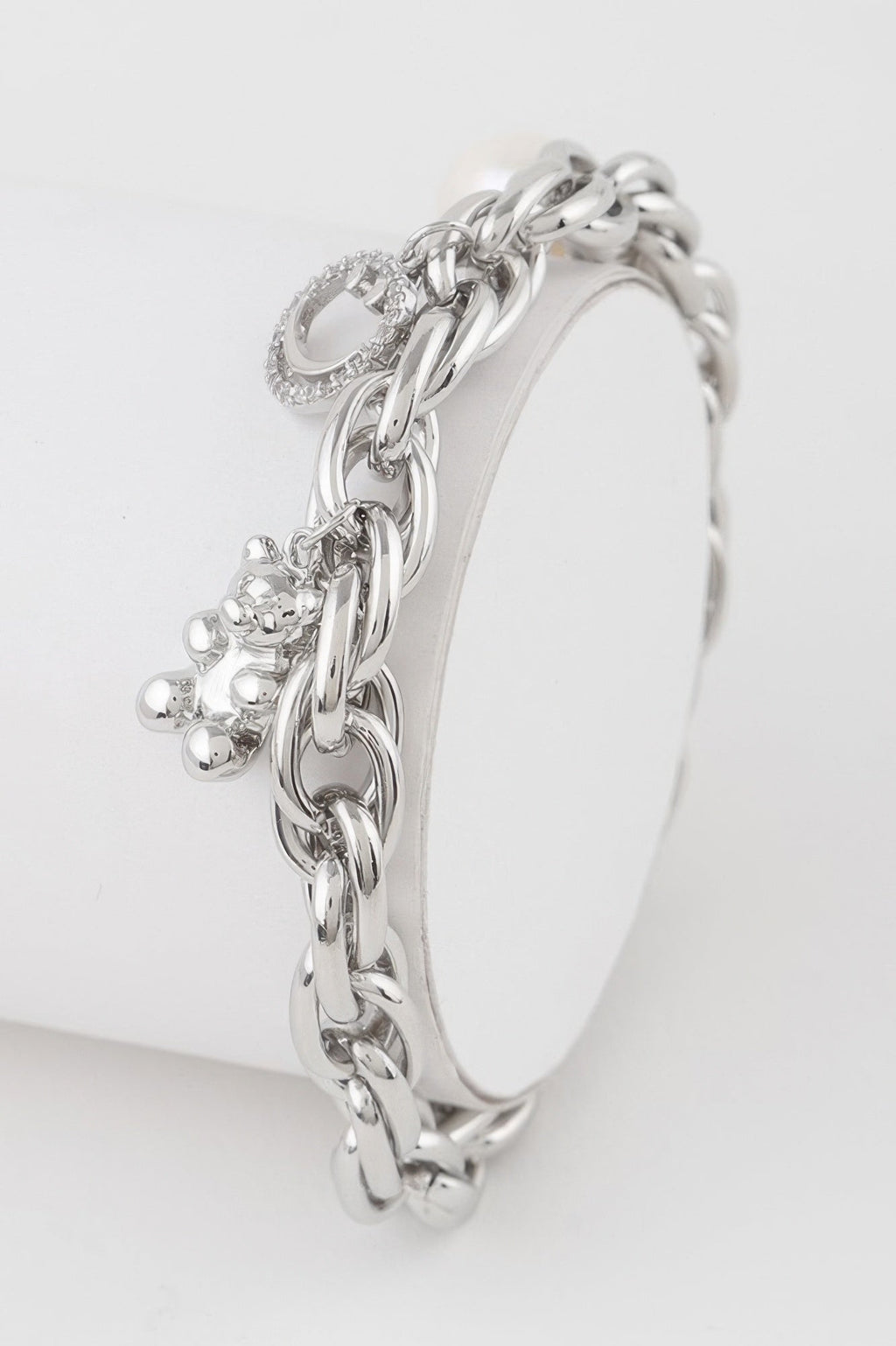 Structured polished metal chain bracelet featuring a charming teddy bear motif for women — view 4