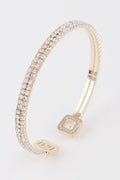 Women's jeweled open cuff bracelet in gleaming metallic finish with sparkling crystal accents