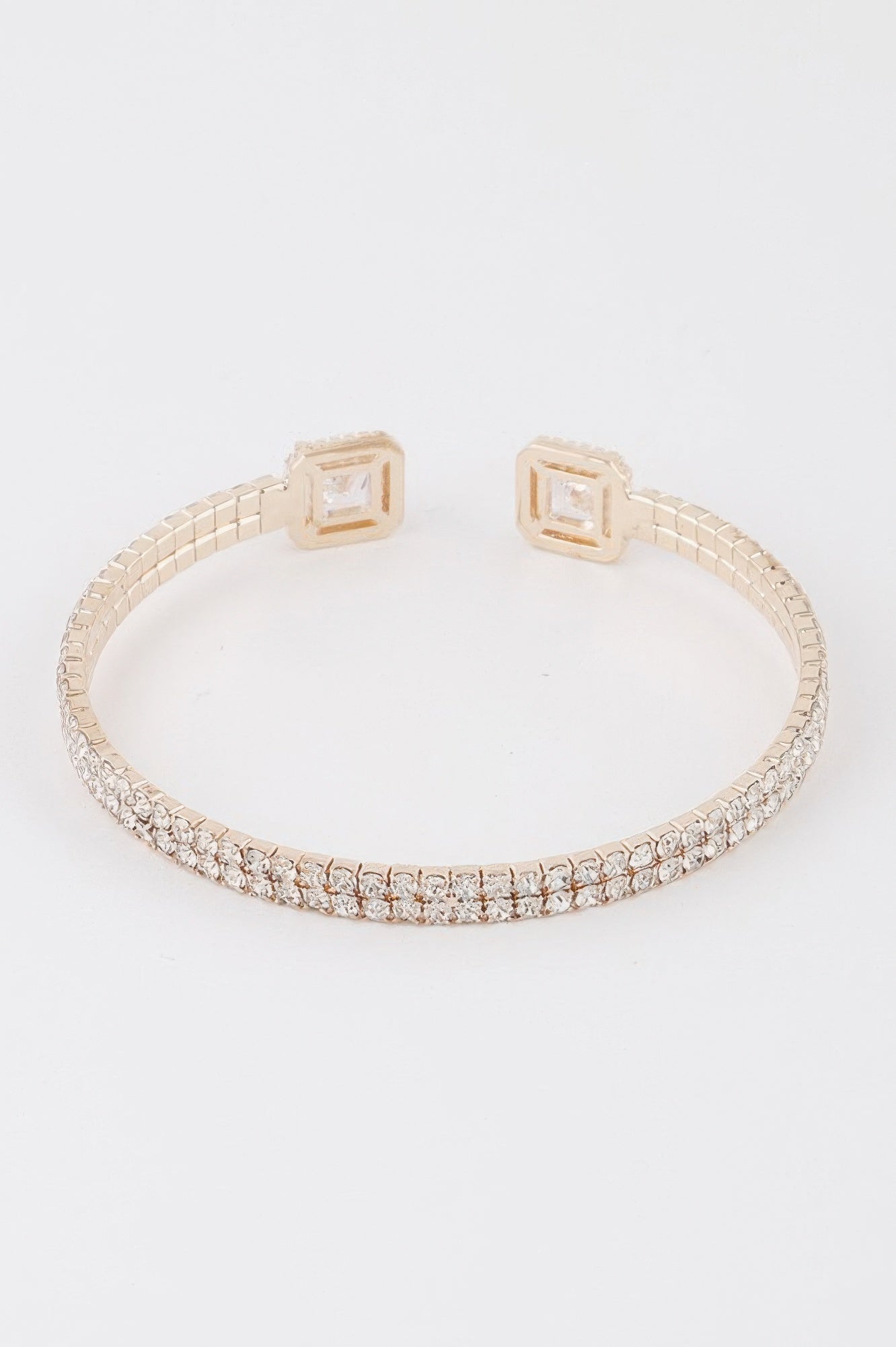 Women's jeweled open cuff bracelet in gleaming metallic finish with sparkling crystal accents — view 2