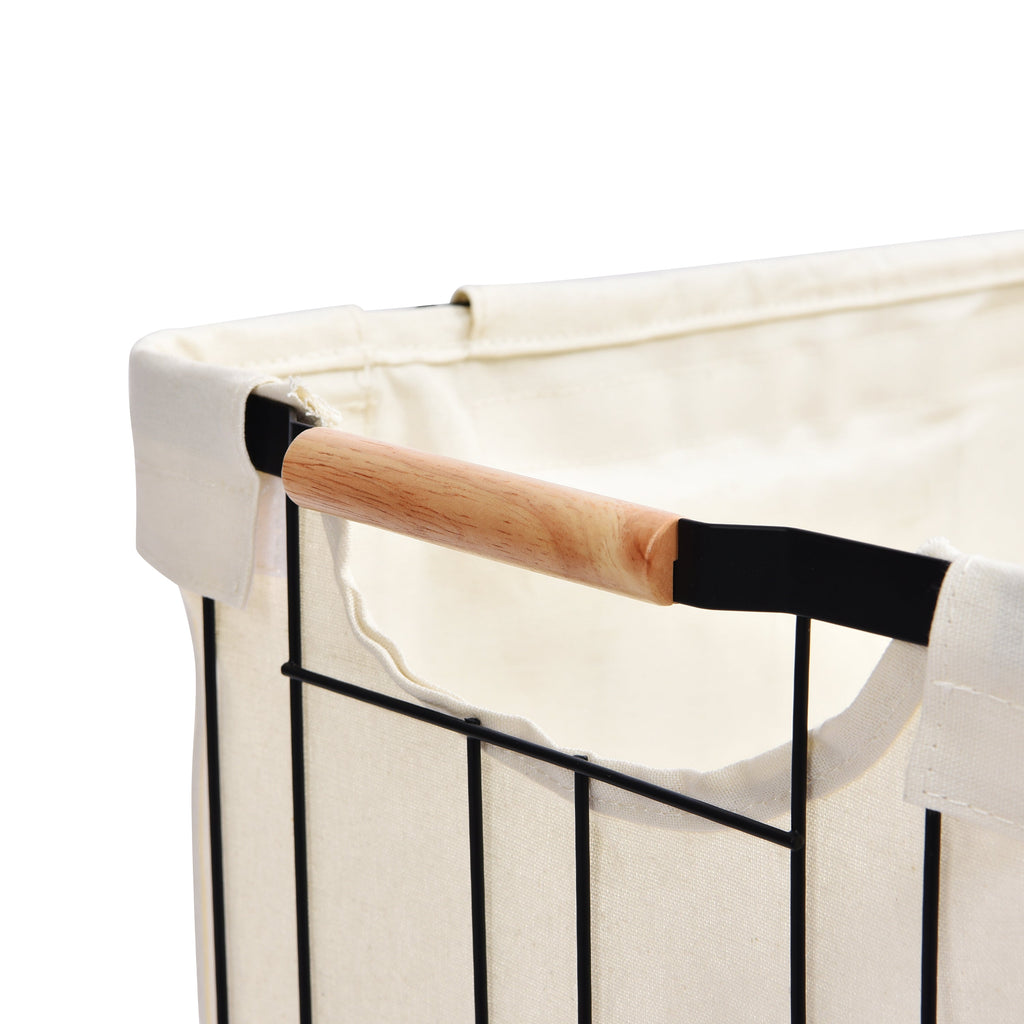 Black mobile rolling laundry cart with heavy duty metal wheels, removable bag, and wood accent handles — view 4