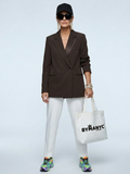Women's brown herringbone tweed blazer featuring a collarless V-neckline and elegant gold-tone button closures.