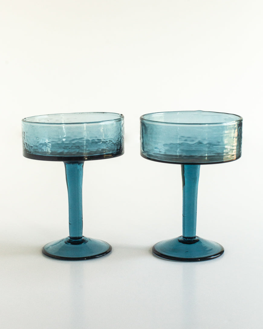 Handblown hammered coupe cocktail glass pair crafted from beautifully textured colored recycled glass. — view 5