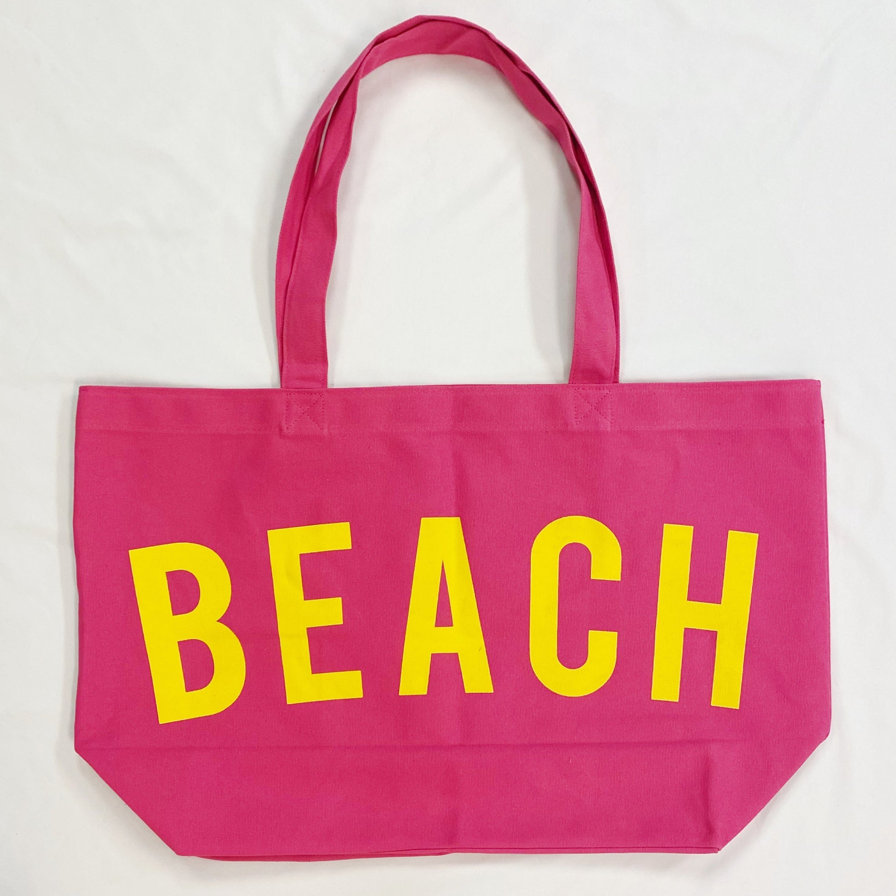 Well made beach canvas tote bag in bold color contrast with sturdy over the shoulder straps. — view 2