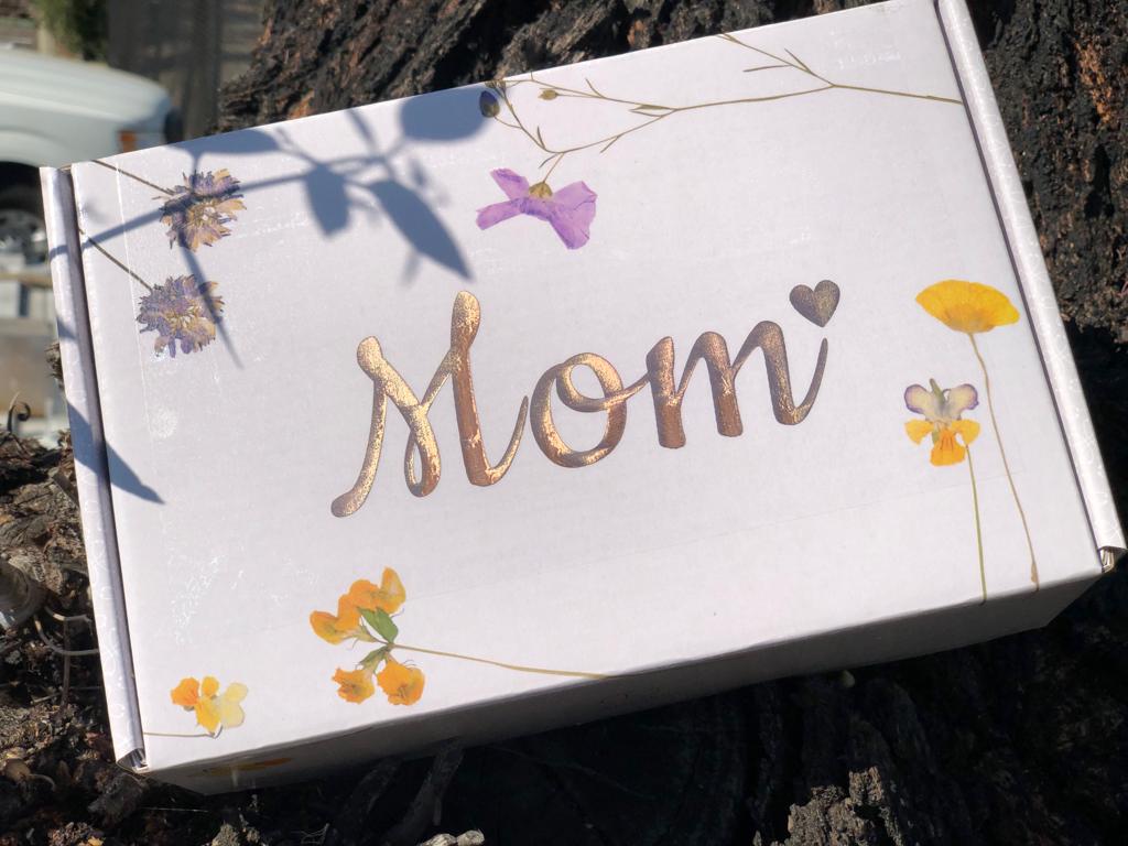 Pampering Mother's Day spa gift box with lavender soap, body oil, candle, and cotton eye mask — view 4