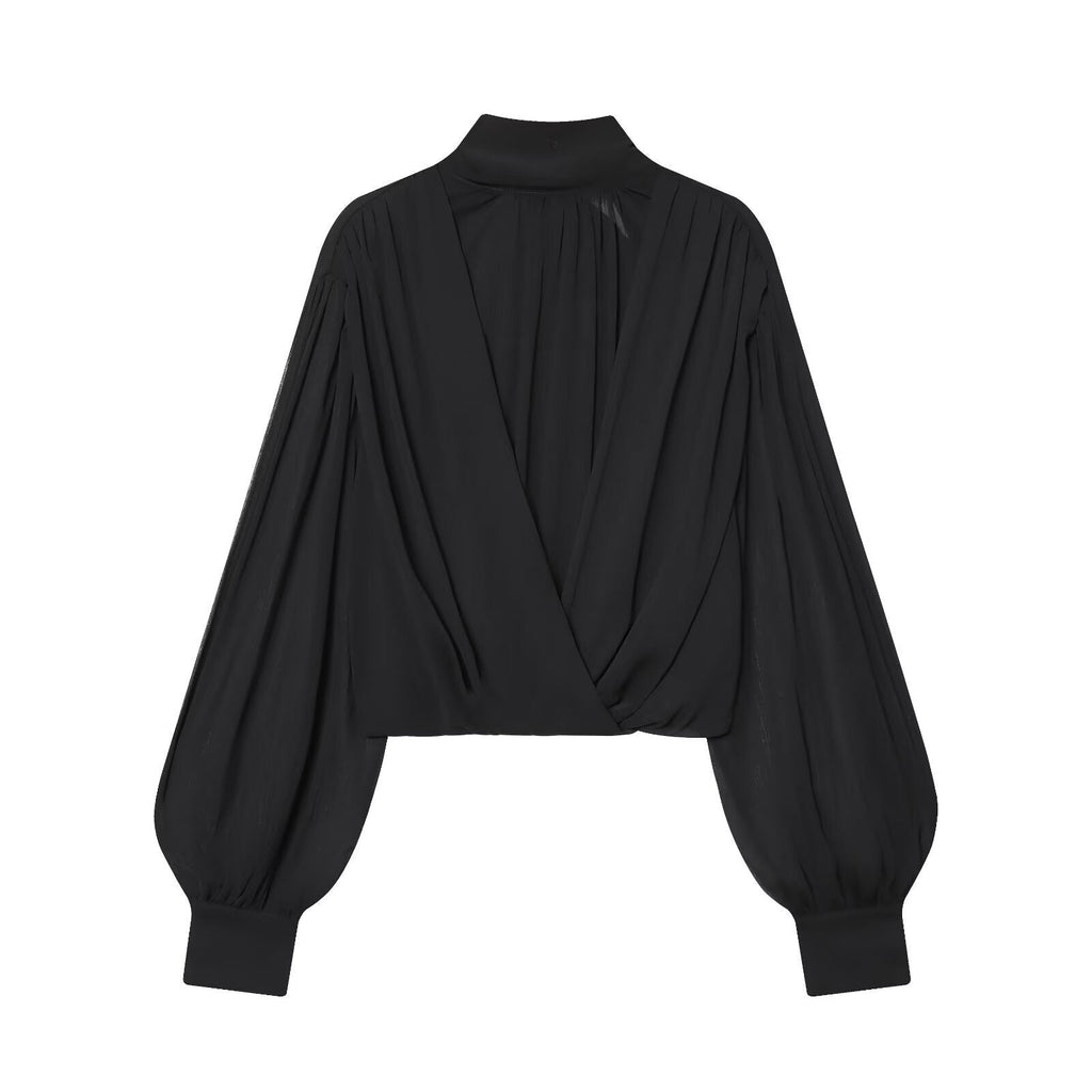 NOLITA women's wrap-inspired blouse featuring a high-neck mock collar and dramatic puff sleeves — view 2