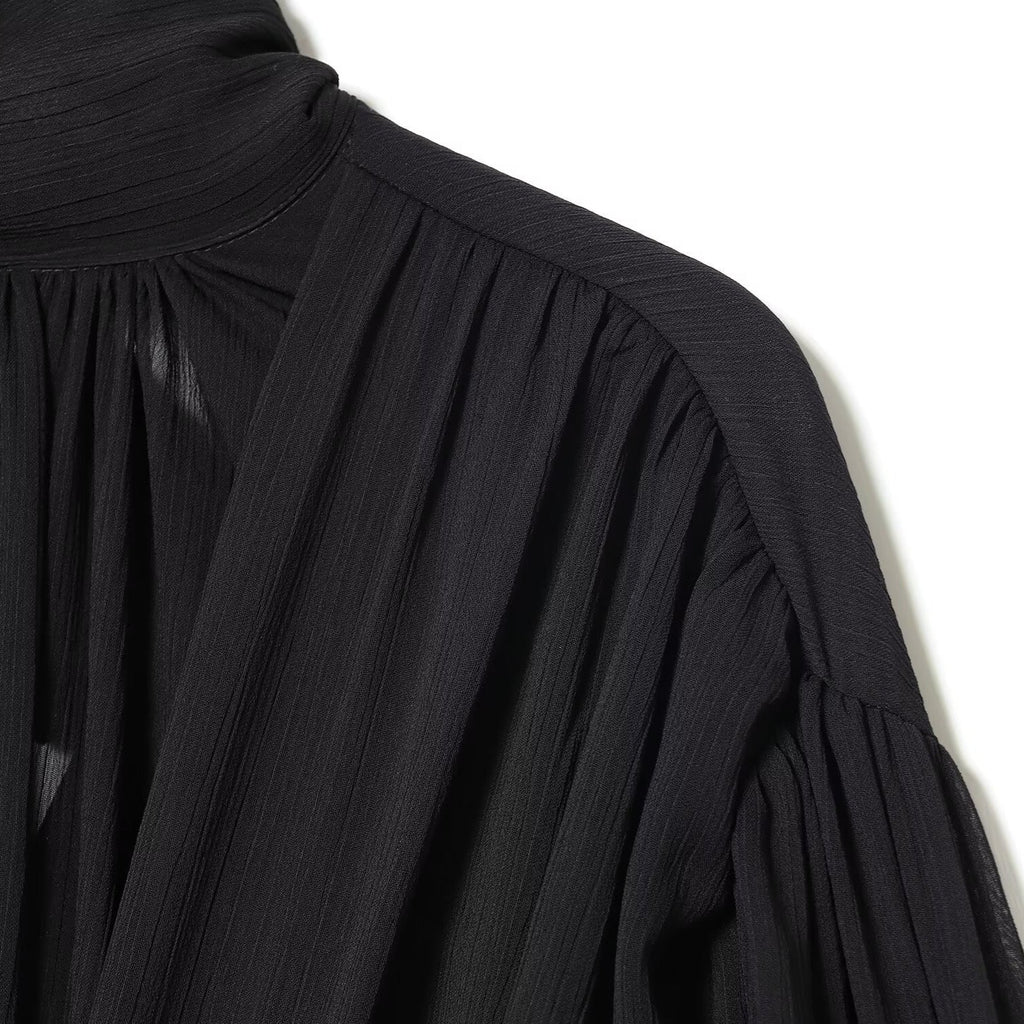 NOLITA women's wrap-inspired blouse featuring a high-neck mock collar and dramatic puff sleeves — view 4