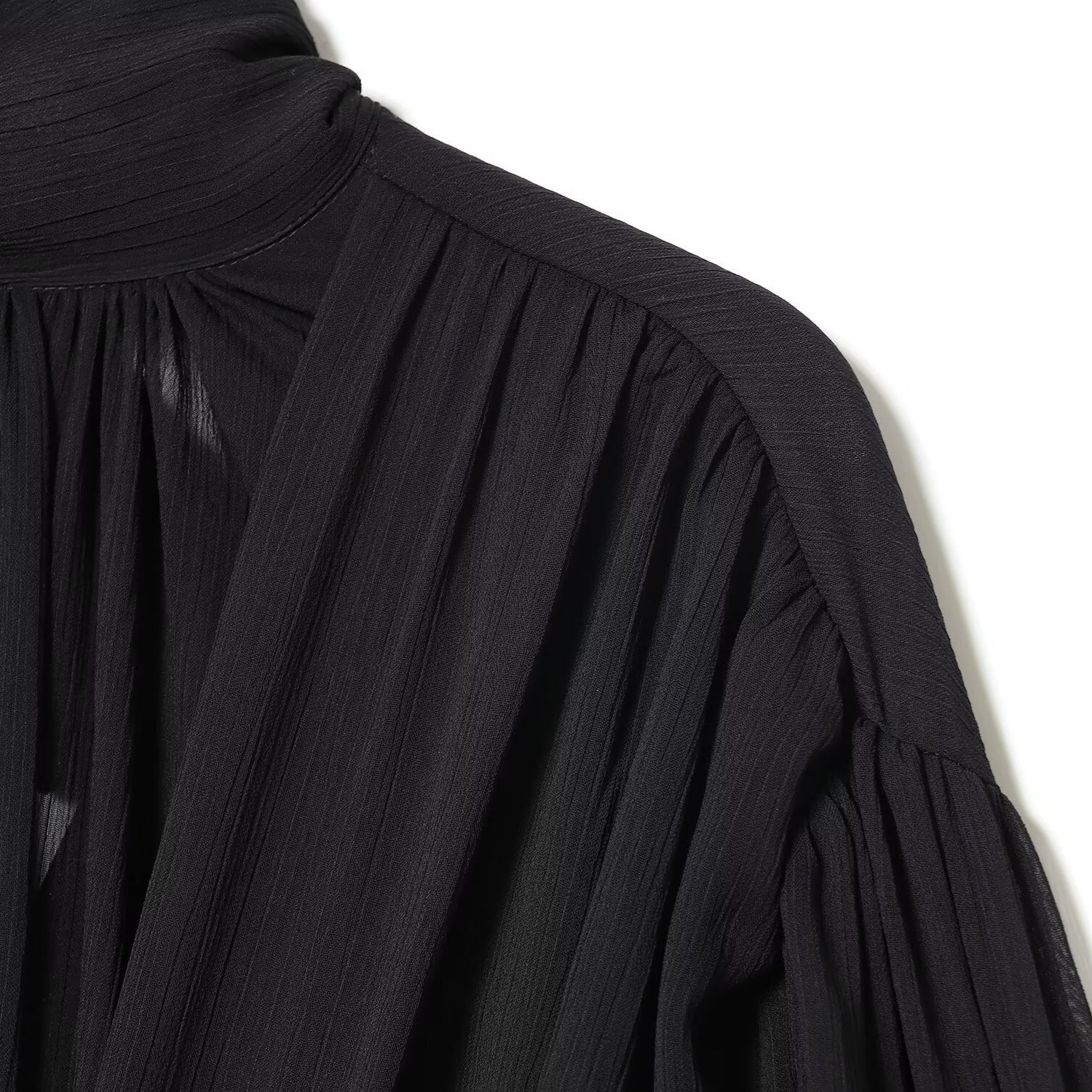 NOLITA women's wrap-inspired blouse featuring a high-neck mock collar and dramatic puff sleeves — view 4