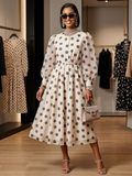 Dorothy polka dot midi dress with puff sleeves elegant women's evening fashion for formal events