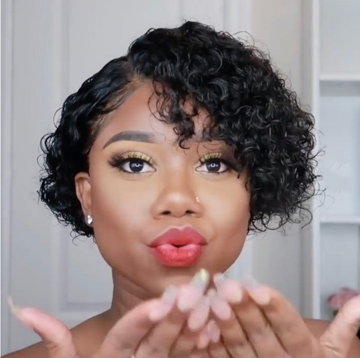 Women's short curly wig in black synthetic hair featuring a chic oblique bang design — view 3