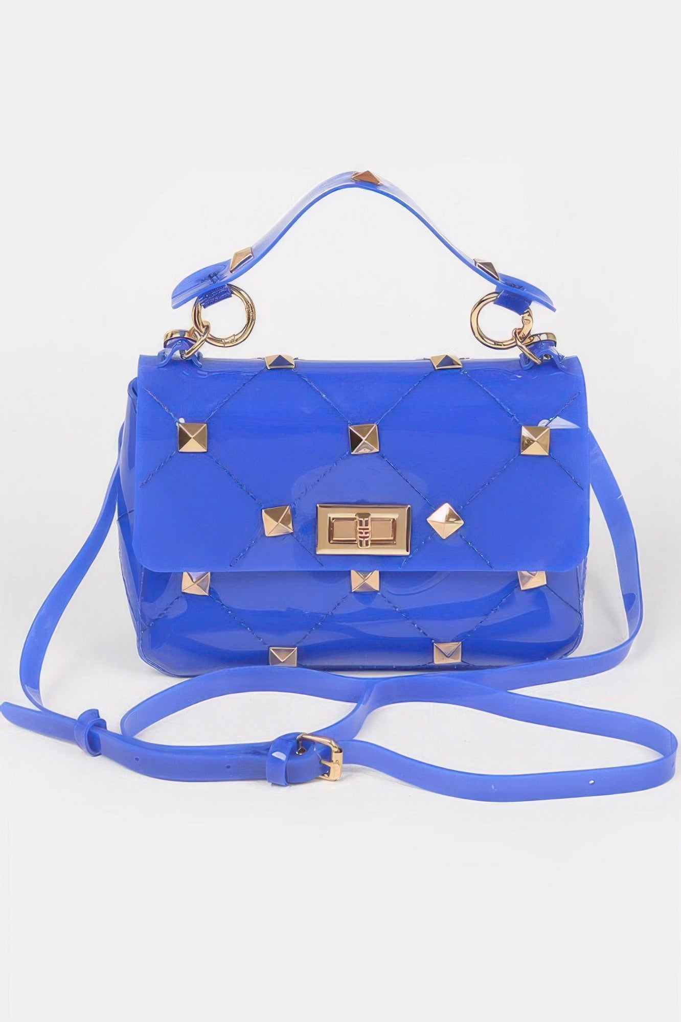 Clear transparent studded polyurethane handbag with top handle and mixed metal hardware