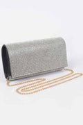 Structured women's rhinestone party clutch handbag with radiant embellishments and sleek metallic accents