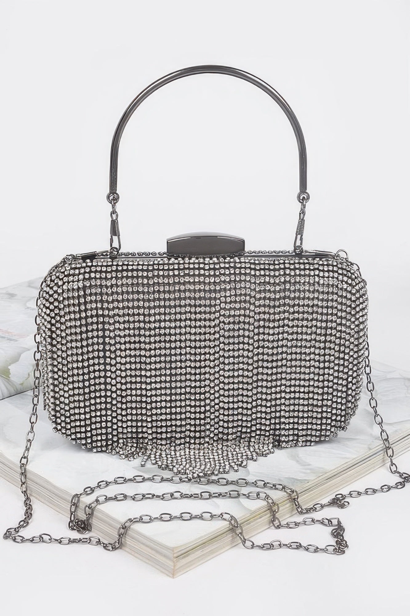 Broadway rhinestone fringe clutch handbag with hard case and shimmering metal accents for formal events