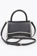 Womens faux leather top handle flap bag with subtle rhinestone embellishments and mixed metal hardware