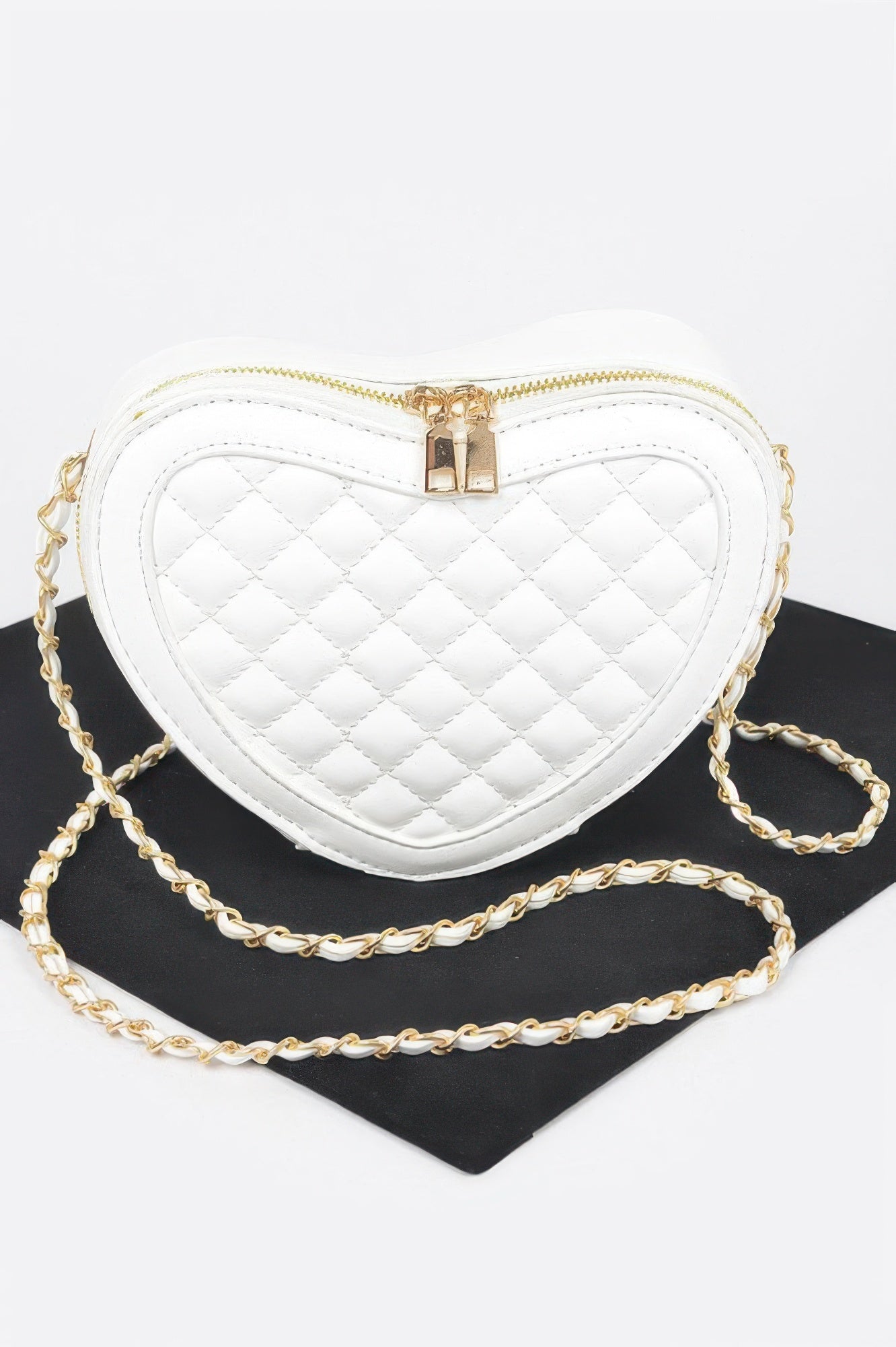 Valentine heart-shaped crossbody handbag with geometric quilted texture and mixed metal hardware — view 3