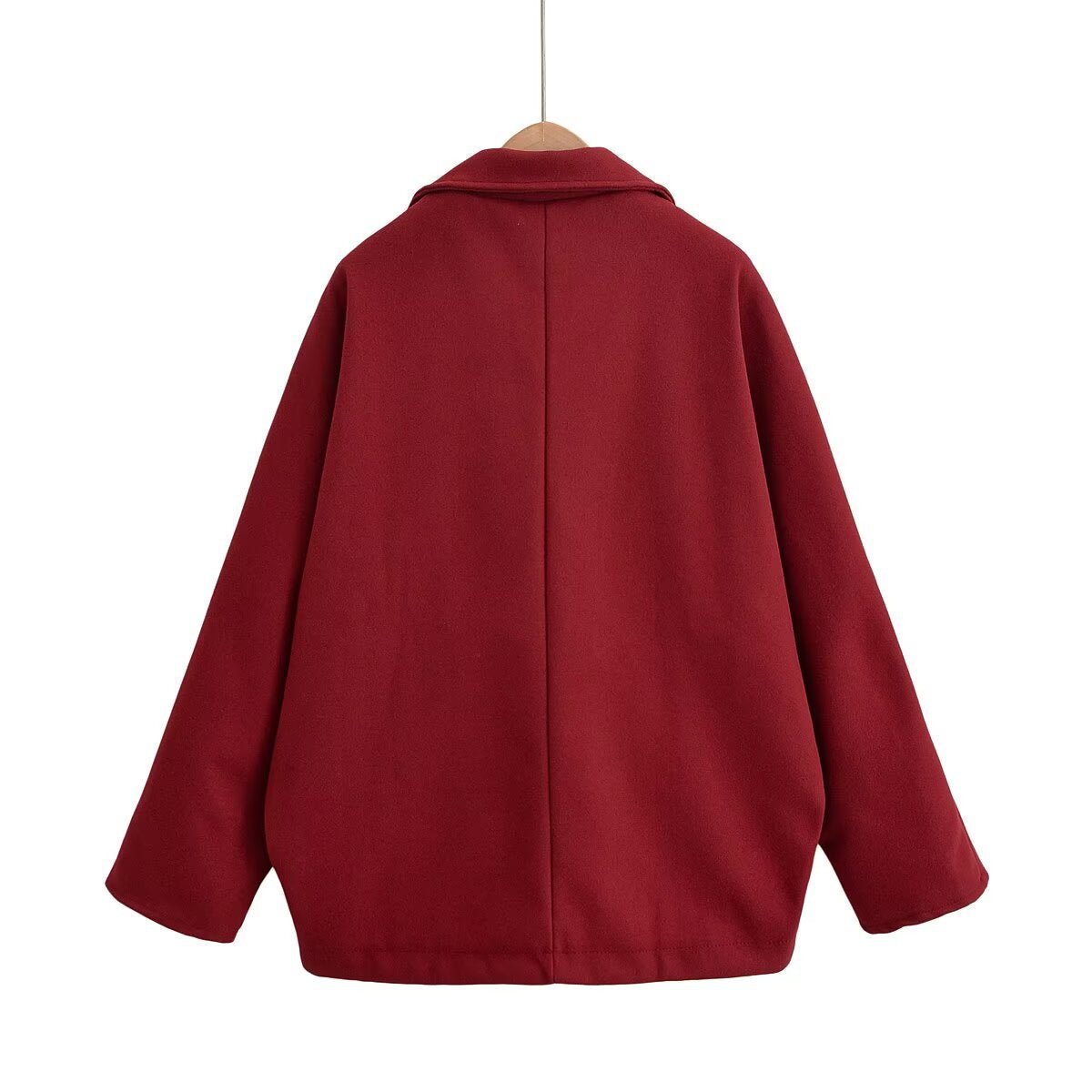 Deep crimson women's jacket with pointed collar, boxy silhouette, and asymmetric button closure — view 2
