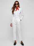 White high-waisted women's dress trousers with matching belt, front pleats, and tapered legs