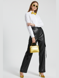 Black vegan leather wide-leg cargo trousers with high waist and side flap pockets.