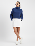 Women's cropped turtleneck sweater in chunky cobalt blue knit with a relaxed boxy fit