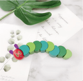 Bright green wooden hungry caterpillar educational toy with movable segments for toddler fine motor skills