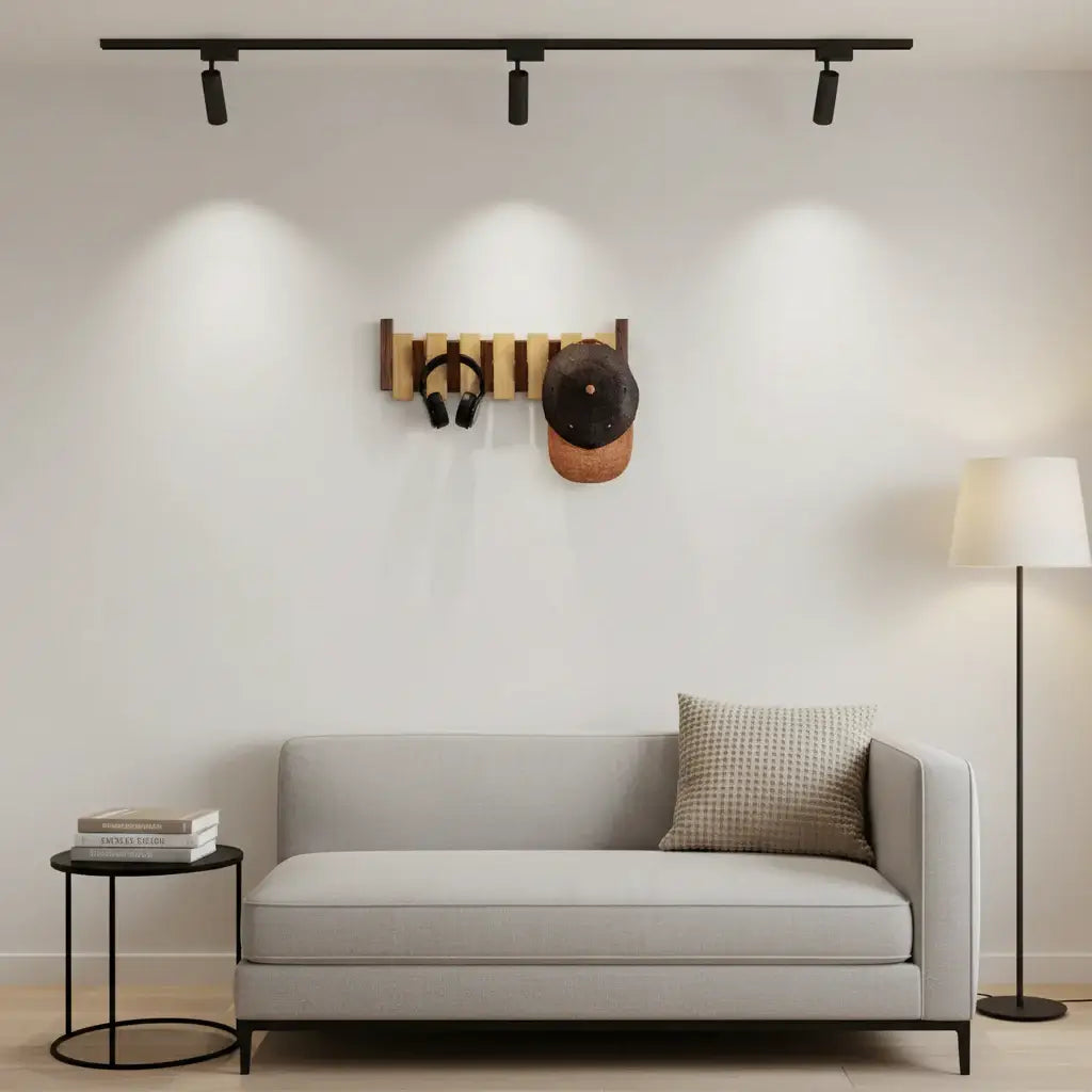 Wooden wall coat rack with six magnetic flip-down hooks mounted in a modern home entryway — view 2