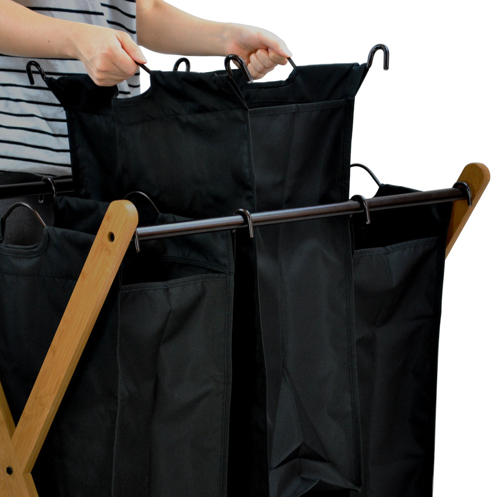 Bamboo three-bag laundry sorter with an X-frame design and black removable polyester compartments — view 11