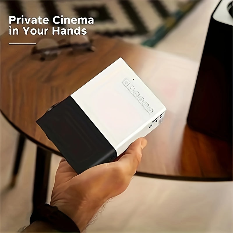 White and yellow YG300 mini portable HD LED projector with lens and control buttons — view 5