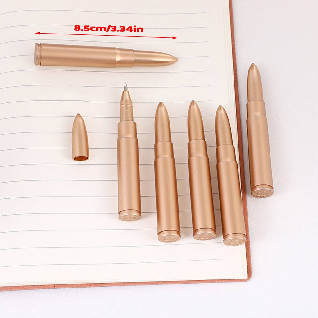 Collection of colorful novelty shape ballpoint pens scattered on a clean desk surface — view 3