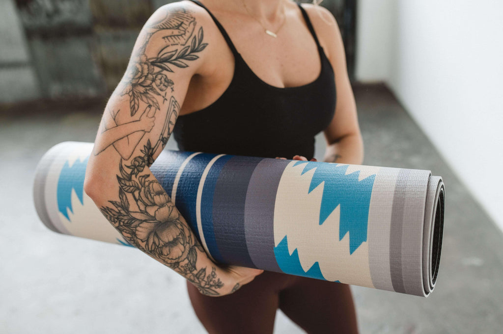 Bear Creek Juniper yoga mat in green with 6mm thickness, rolled out for exercise — view 4