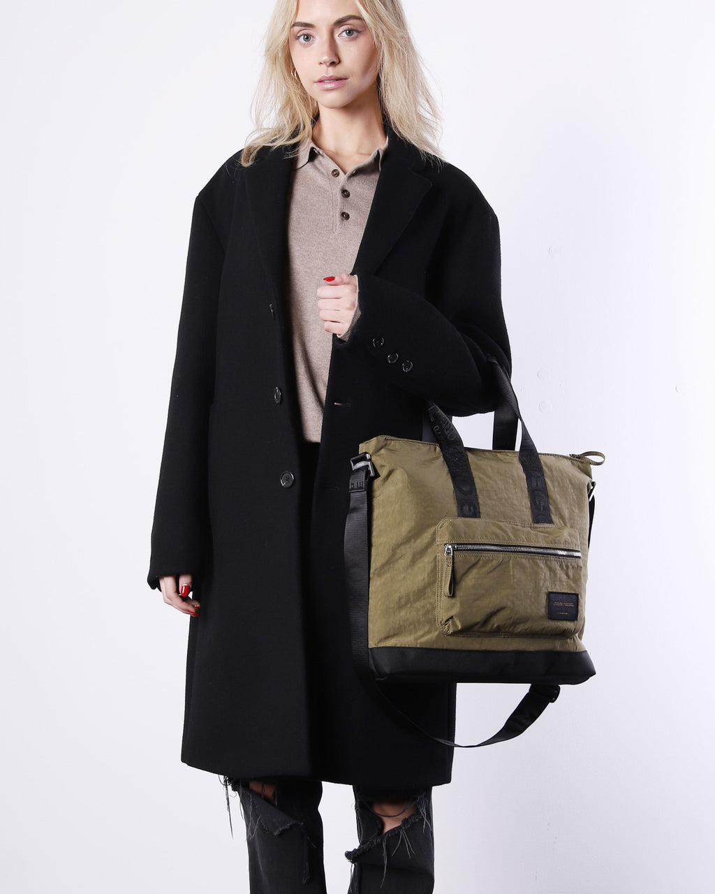 Olive green nylon unisex laptop tote bag with zip pockets and top carrying handles