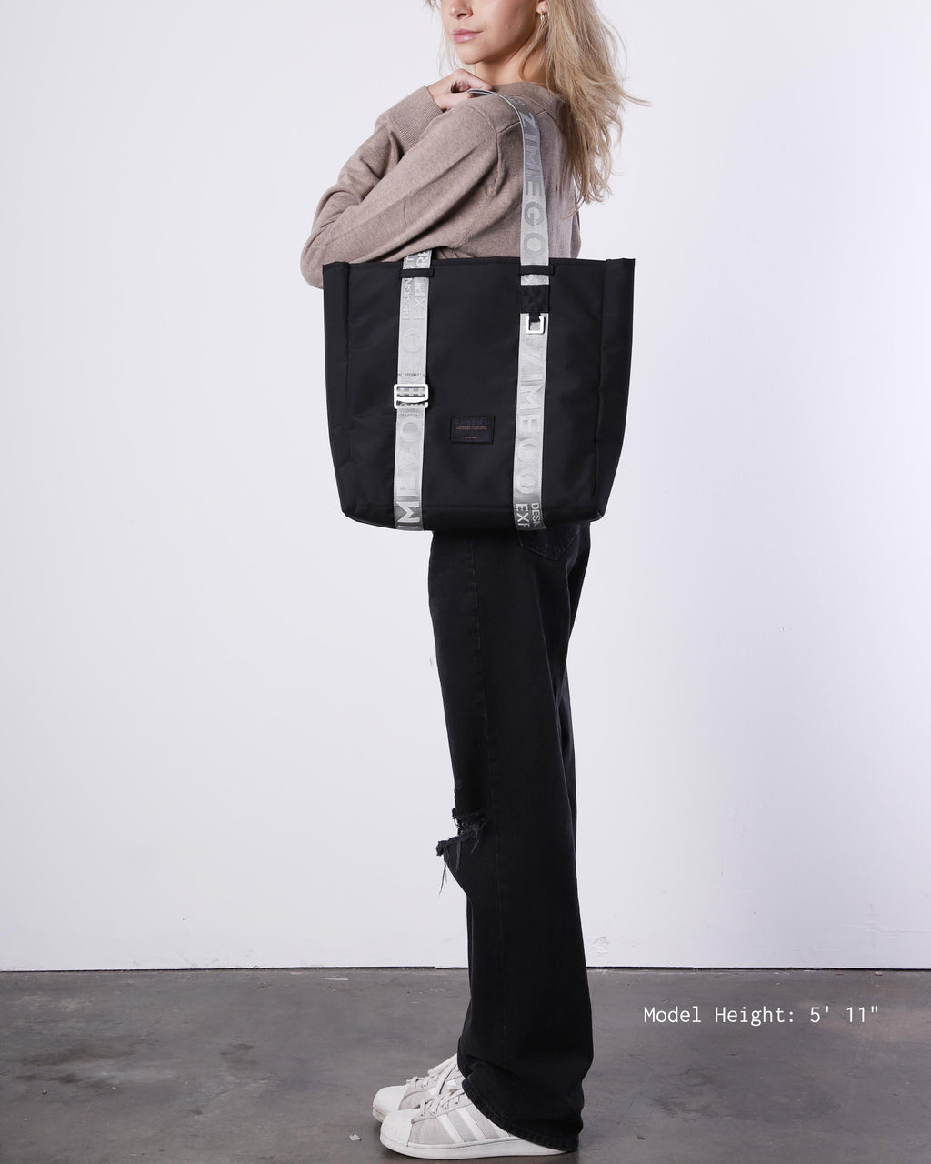Navy blue nylon laptop tote bag with metallic silver straps and adjustable handles — view 5