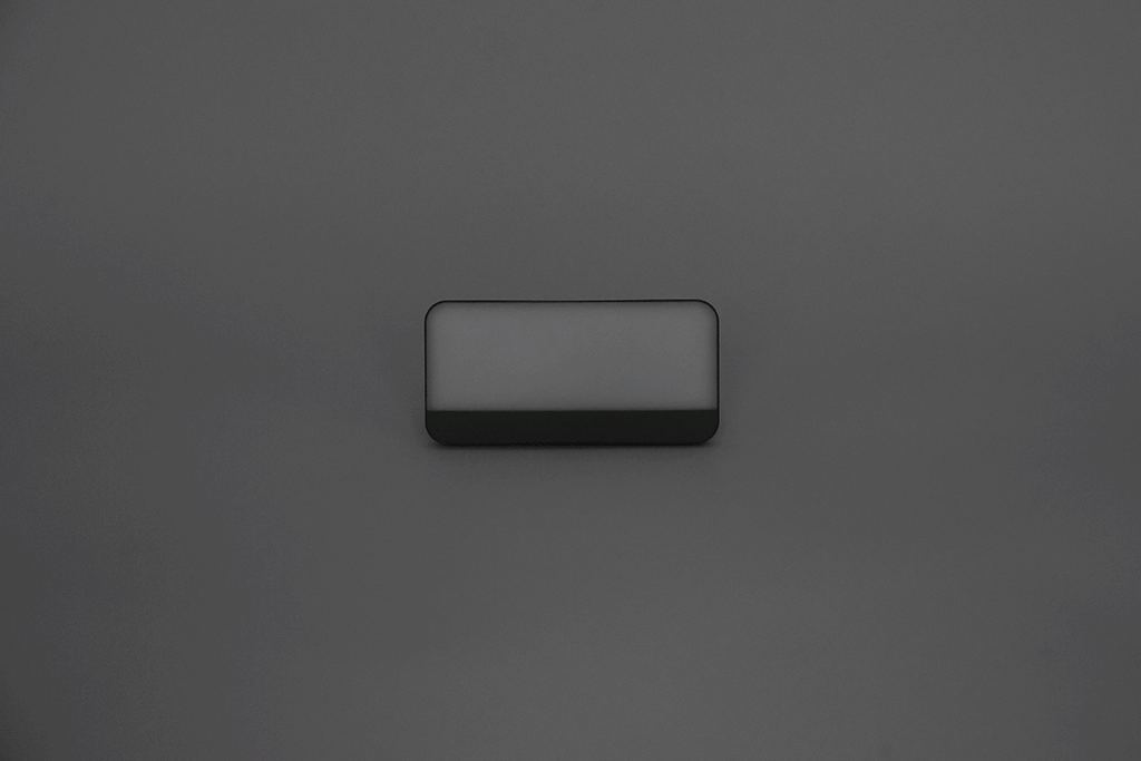 Portable LED light with MagSafe wireless charging illuminating an electric vehicle interior — view 5