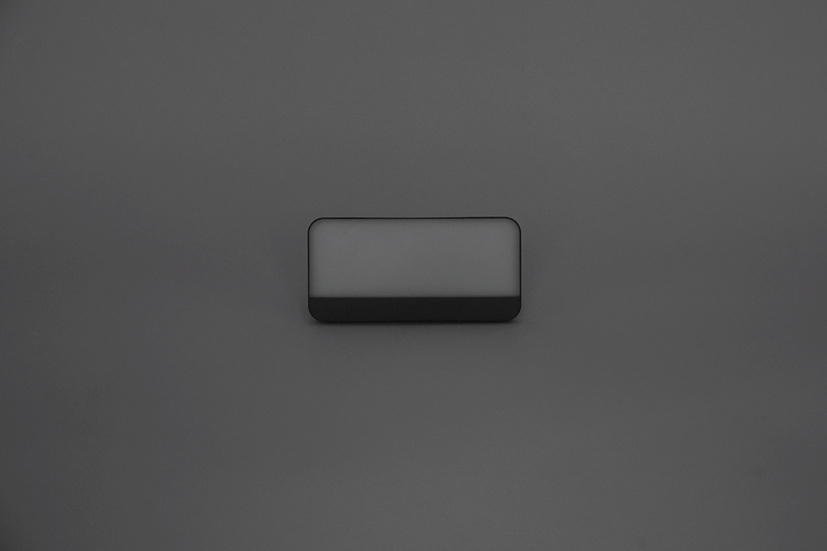 Portable LED light with MagSafe wireless charging illuminating an electric vehicle interior — view 5