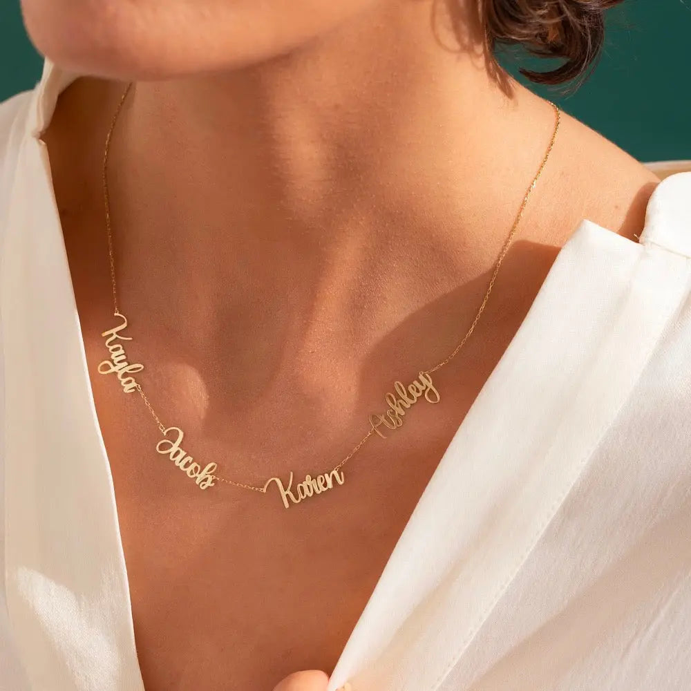 Personalized multiple name necklace in gold featuring custom elegant script fonts on an adjustable chain