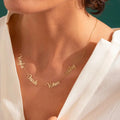 Personalized multiple name necklace in gold featuring custom elegant script fonts on an adjustable chain