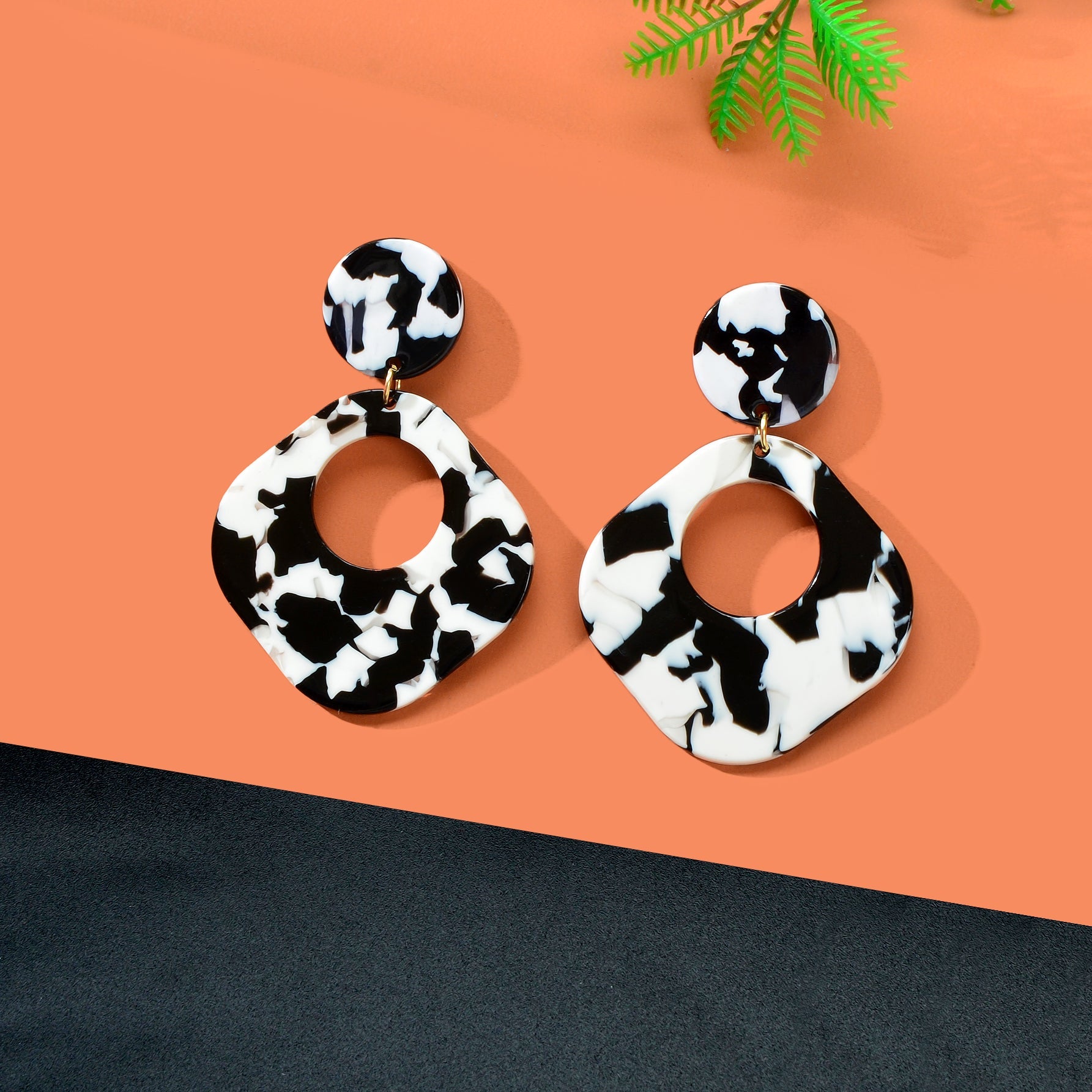 Retro black and white acrylic tortoise shell dangle earrings with round and square geometric design — view 5