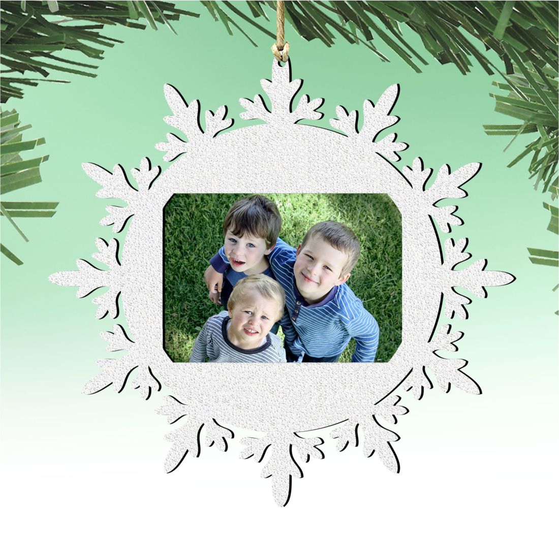 Wooden snowflake Christmas photo ornament featuring a central picture frame for festive tree decorations — view 5