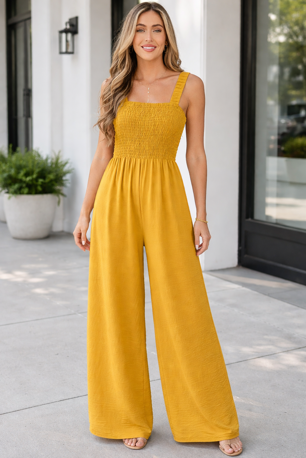 Rebecca sleeveless wide leg jumpsuit in ginger orange featuring a square neckline and ruched waist