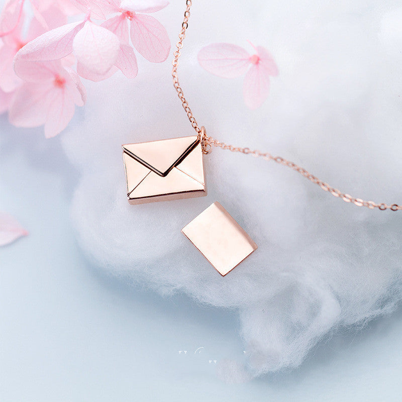 Elegant envelope locket necklace with adjustable chain, a personalized love letter keepsake in polished gold. — view 4