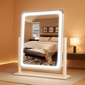LED lighted vanity mirror with aluminum frame and smart touch controls on a desktop.