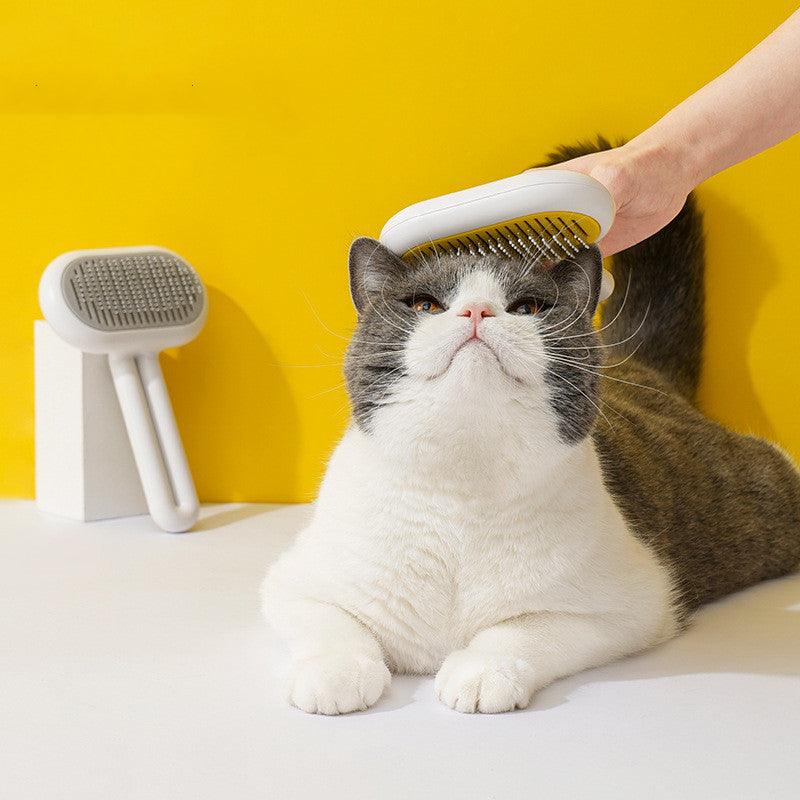Ergonomic pet grooming comb with stainless steel bristles and a sleek capsule shape handle