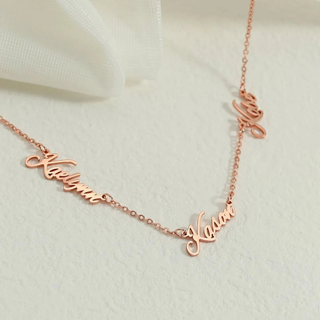Personalized multiple name necklace in gold featuring custom elegant script fonts on an adjustable chain — view 4