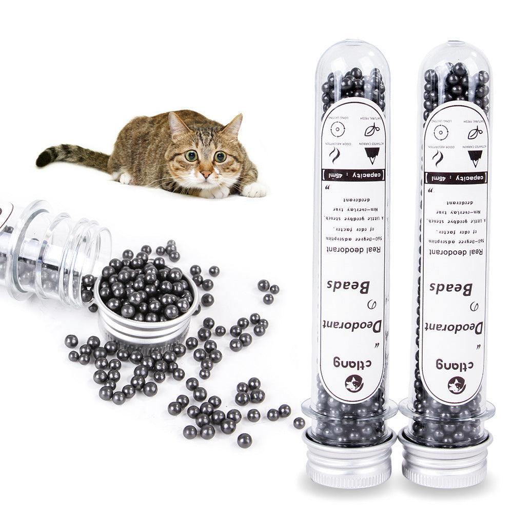 Activated carbon cat litter deodorizer beads in a small bottle for odor control.