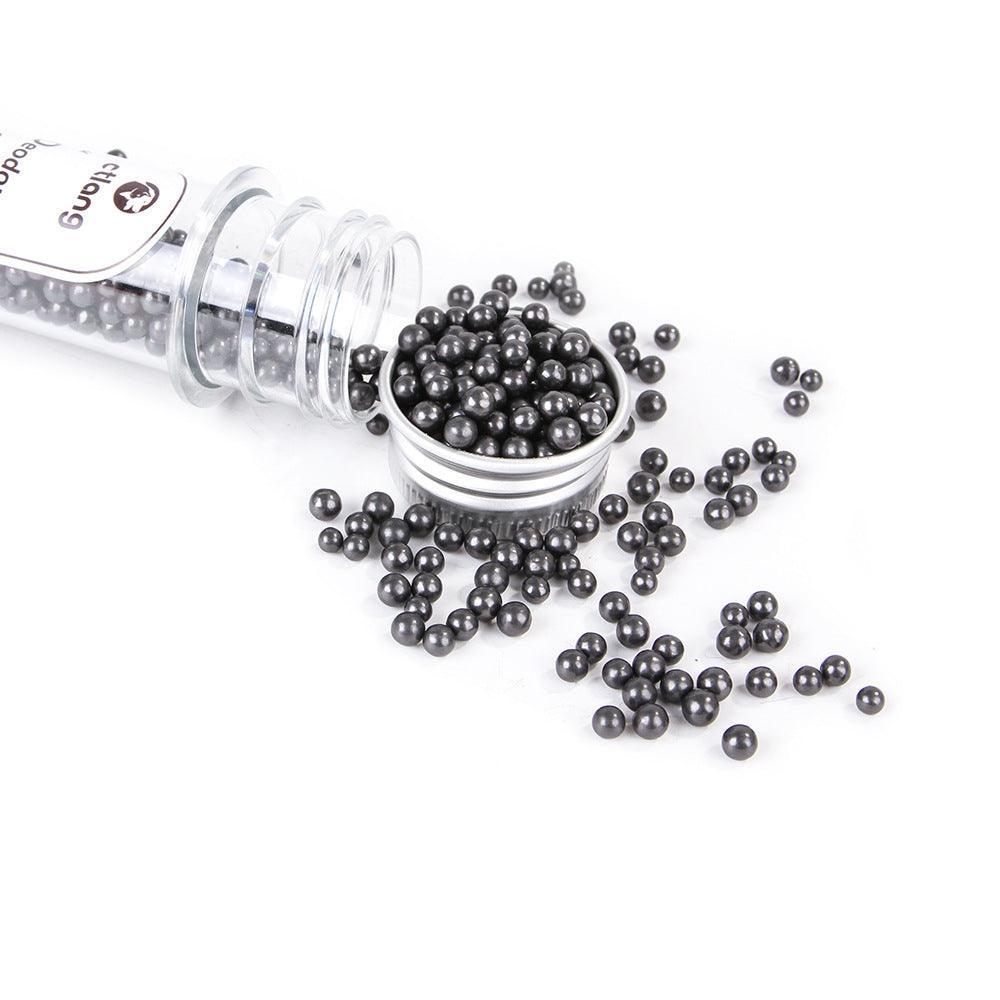 Activated carbon cat litter deodorizer beads in a small bottle for odor control. — view 4